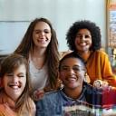 Group of students practicing English in a classroom