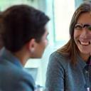 Tutor and student in one-to-one session